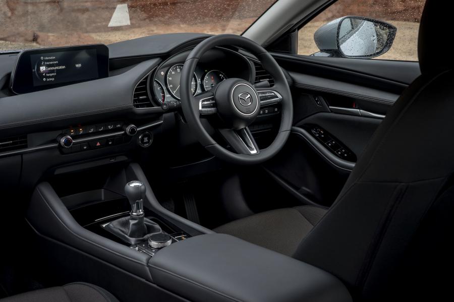 Интерьер Mazda3 Skyactiv-X Sport Sedan (BP) 2019 года  (UK) (фото 12 из 42)
